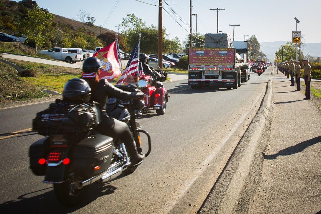 Patriot Guard Riders of Southern California with American Legion Riders escort the 5th Marines Vietnam War Memorial at Marine Corps Base Camp Pendleton, Calif., March 29, 2018.