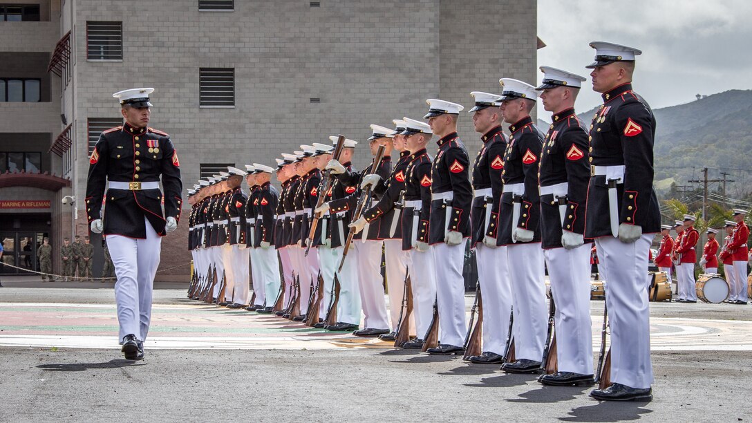 U.S. Marines with the Silent Drill Platoon with the Battle Color Detachment, perform during the Battle Color ceremony at Marine Corps Base Camp Pendleton, Calif., March 15, 2018.