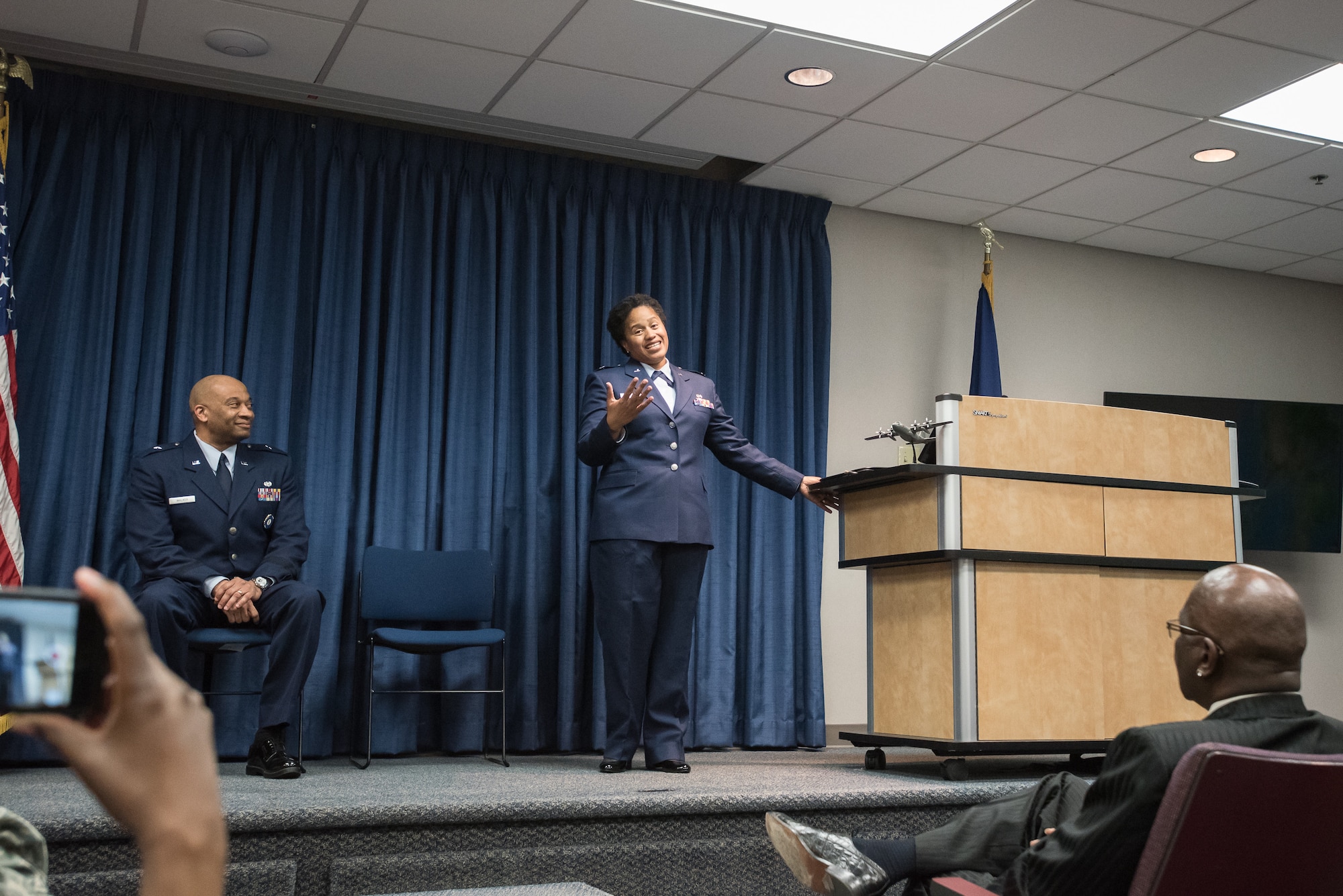 Newly promoted Col. Joyce Gordon, state judge advocate for Headquarters, Kentucky Air National Guard, speaks to the audience during her promotion ceremony at the Kentucky Air National Guard Base in Louisville, Ky., April 14, 2018.