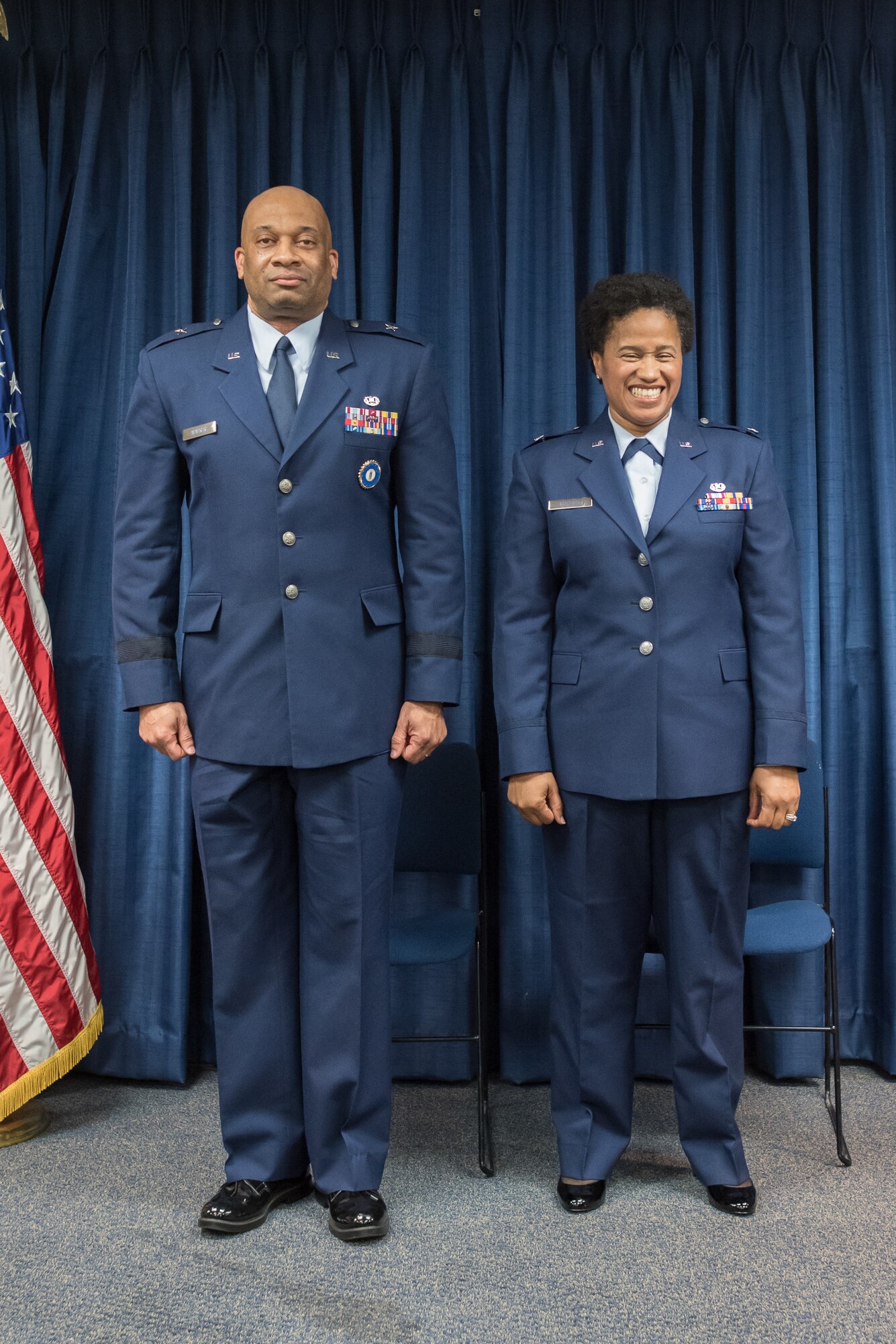 Joyce Gordon (right), state judge advocate for Headquarters, Kentucky Air National Guard, is promoted to the rank of colonel during a ceremony at the Kentucky Air National Guard Base in Louisville, Ky., April 14, 2018. The event was officiated by Brig. Gen. Charles Walker (left), chief off staff for Headquarters, Kentucky Air National Guard.