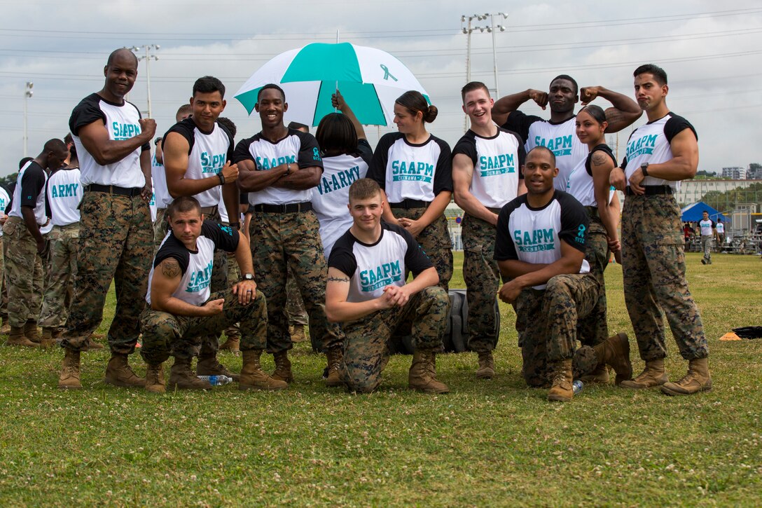 Marines pose for a group photo at the conclusion of the event.