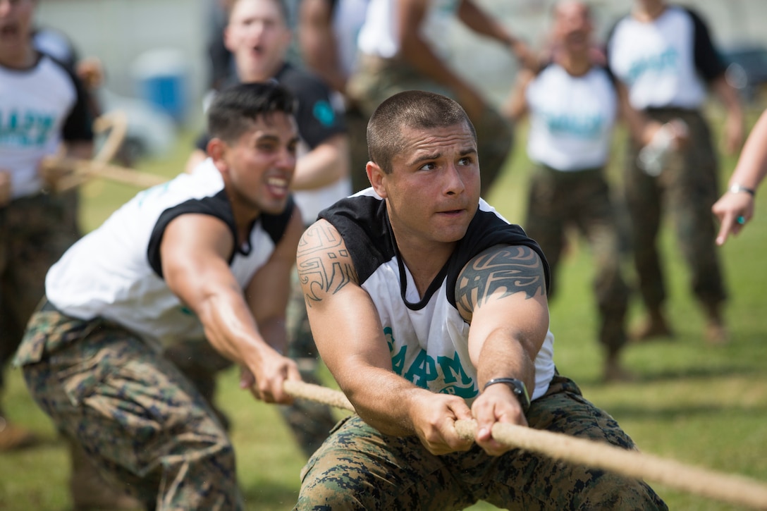 A Marine pulls a rope during the Sexual Assault Prevention and Response Field meet.