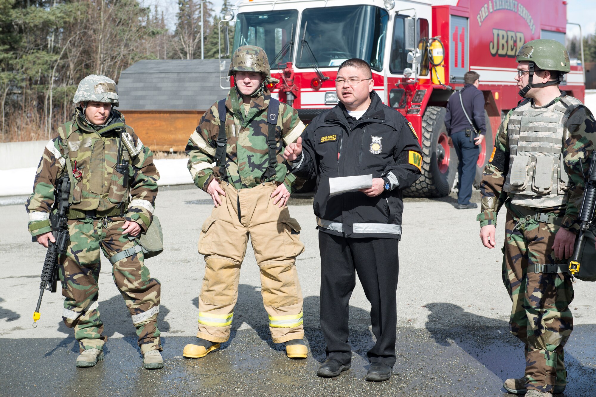 The 673d Civil Engineer Squadron Fire and Emergency Services participate in exercise Polar Force 18-5 at Joint Base Elmendorf-Richardson, Alaska, April 11, 2018. Throughout the routine training exercise, Airmen donned Mission Oriented Protective Posture gear while completing various mission-related tasks to test their capabilities in challenging circumstances.