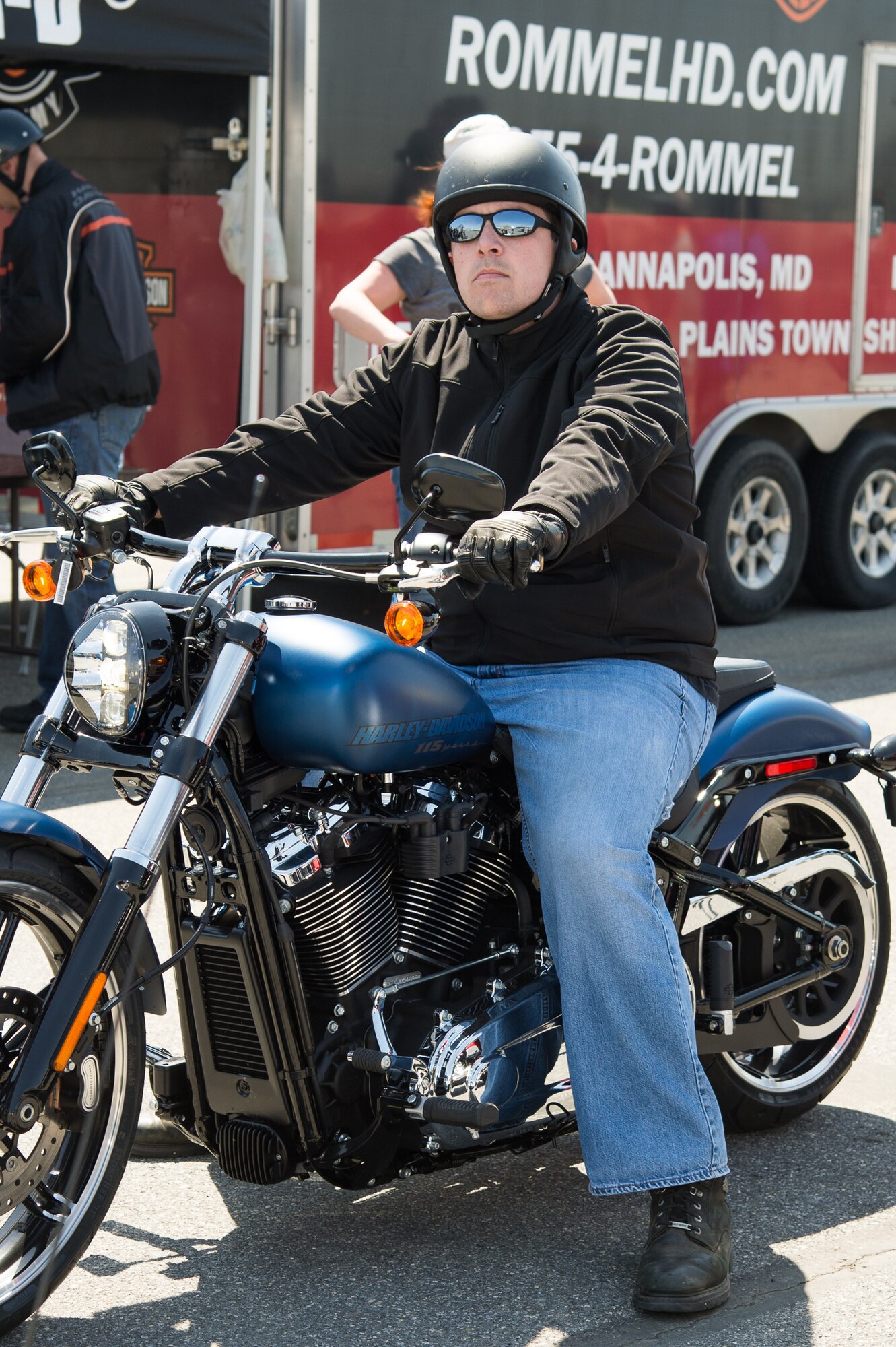 An attendee prepares for a test drive during Motorcycle Safety Day April 13, 2018, at Dover Air Force Base, Del. Rommel Harley Davidson of Smyrna and Diamond Motorsports of Camden brought out a variety of motorcycles and offered free test rides at the event. (U.S. Air Force photo by Mauricio Campino)