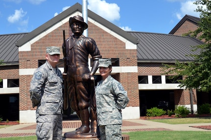 Air Force Master Sgts. Herbert “Glen” Bates, left, and Stephanie Bates are the first spouses to serve concurrently as first sergeants in the Arkansas Air National Guard’s 189th Airlift Wing.