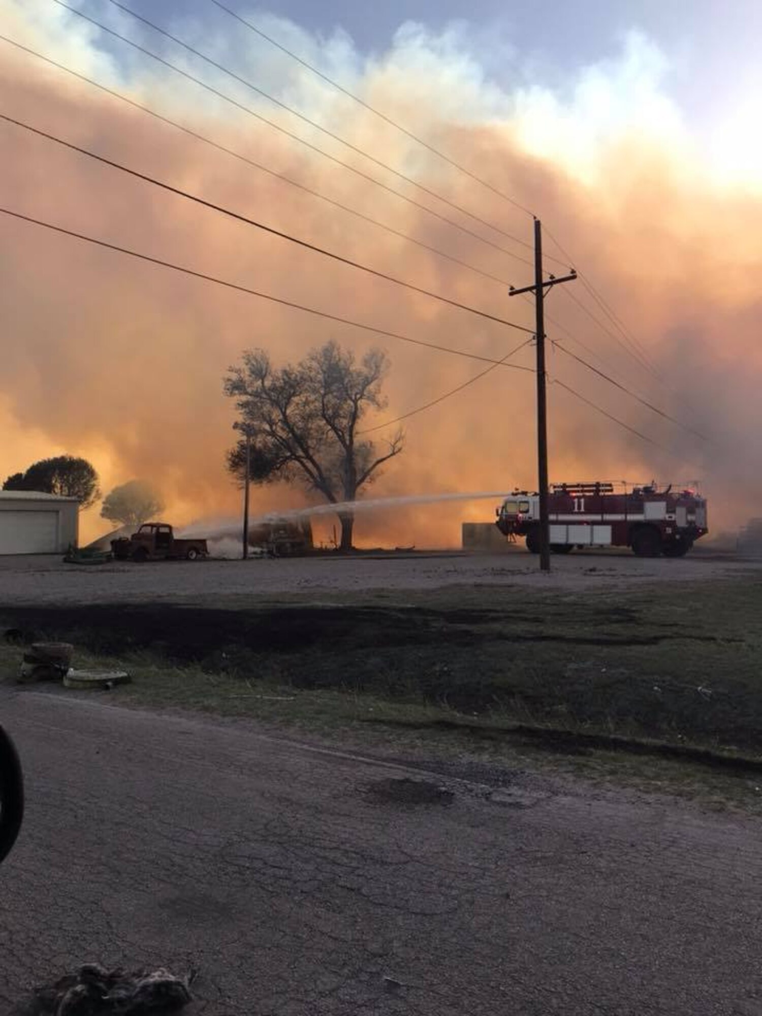 Mutual aid responders suppress a major fire, April 14, 2018, Martha, Okla.