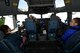 The Altus Air Force Base Honorary Commanders took turns sitting in the cockpit of the C-17 Globemaster III to observe the familiarization flight, April 16, 2018, at Altus AFB, Okla.