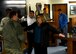 Rita Beisel, honorary commander of the 97th Maintenance Group, is screened by members of the 97th Logistics Readiness Squadron for potential hazards before boarding a familiarization flight, April 16, 2018, at Altus Air Force Base, Okla.