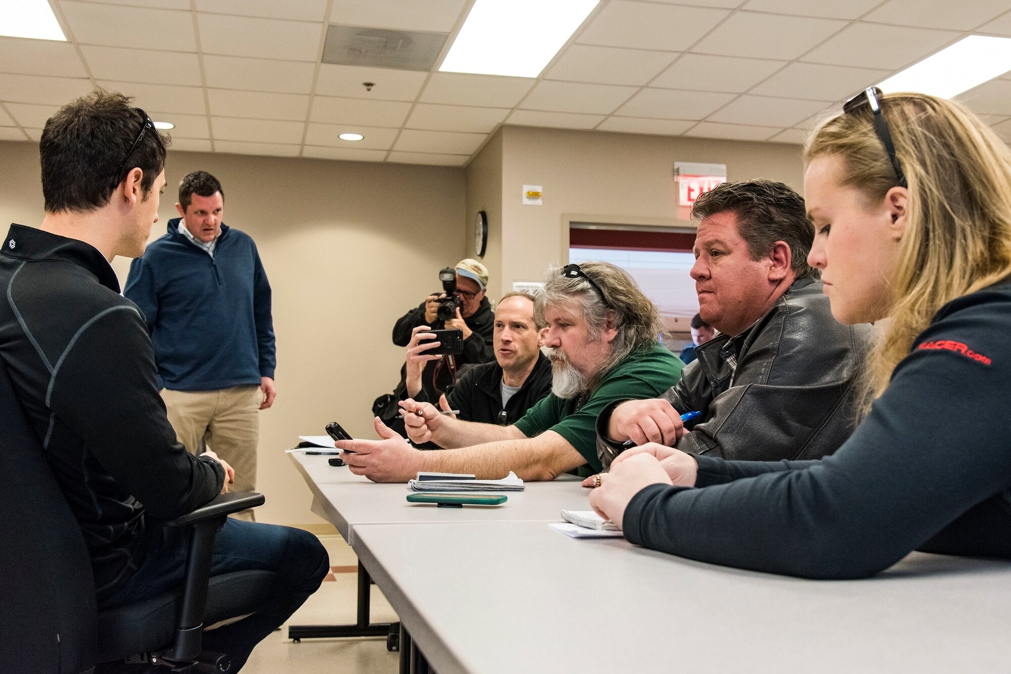 Joey Logano, driver of the No. 22 Ford in the Monster Energy NASCAR Cup Series, speaks with members of the media during a question and answer session April 11, 2018, at Dover Air Force Base, Del. The media session was held inside the training room located at the 436th Operations Support Squadron aircrew flight equipment facilities. (U.S. Air Force photo by Roland Balik)