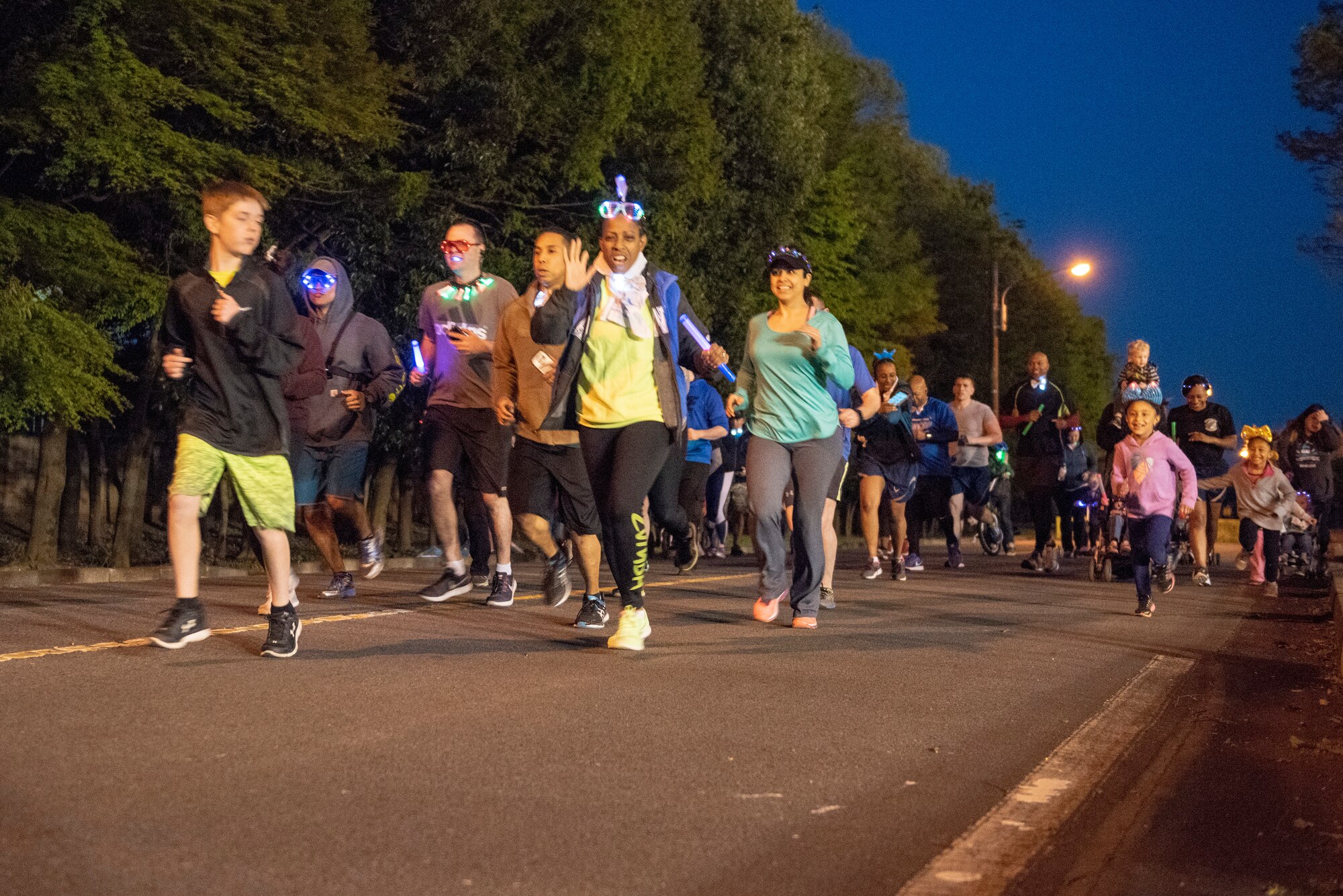 Participants in the Light the Night 5k run by the starting point of the race at Yokota Air Base, Japan, April 13, 2018.