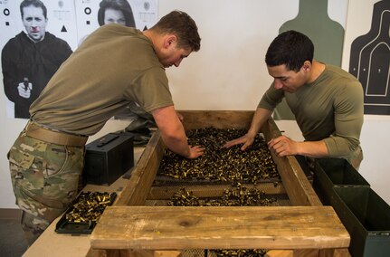 U.S. Army Specialists Arturo Dominguez and Eric Haugh, snipers assigned to the 1st Squadron, 40th Cavalry Regiment (Airborne), 4th Infantry Brigade Combat Team (Airborne), 25th Infantry Division, U.S. Army Alaska, account for empty shells at Joint Base Elmendorf-Richardson, Alaska, April 11, 2018, during marksmanship training. A sniper's main responsibility is to deliver discriminatory, highly accurate rifle fire against enemy targets that cannot be engaged successfully by the regular rifleman due to range, size, location, fleeting nature, or visibility.