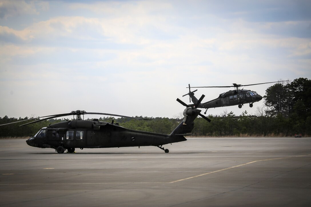 Soldiers prepare their UH-60L Black Hawk helicopter.