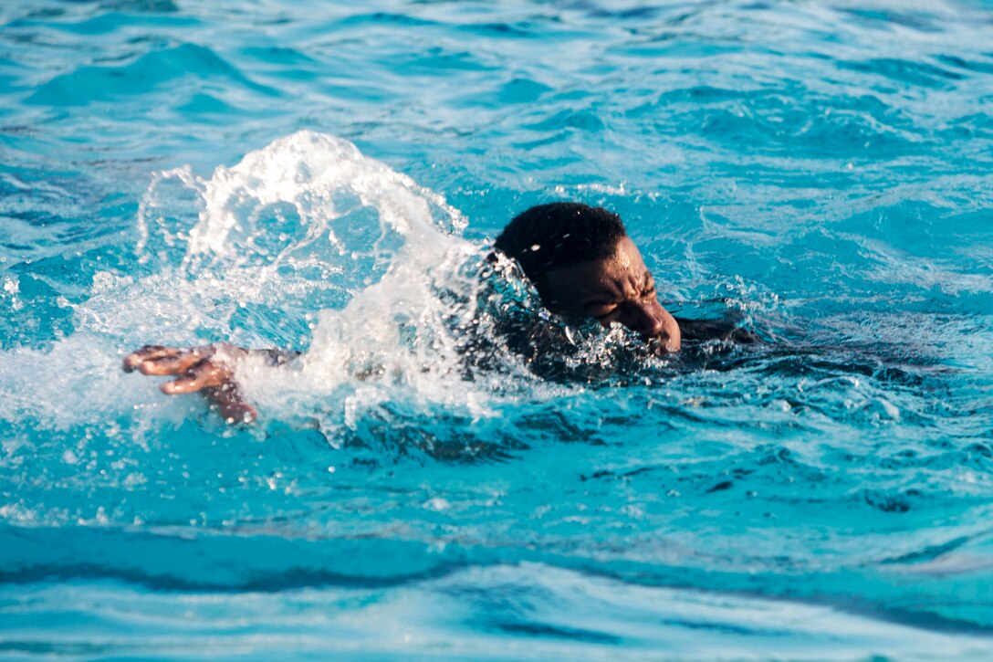 A Marine swims 25-yards during the course.