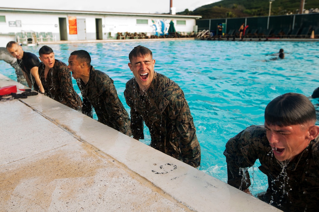 Marines participate in water physical training.