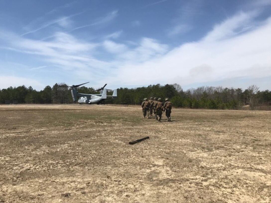 Marines with Company A., 4th Combat Engineer Battalion, 4th Marine Division, Marine Forces Reserve, conduct a helicopter borne assault via MV-22 and CH-53 platforms during platoon attacks as part of a Mission Rehearsal Exercise aboard U.S. Army Fort A.P. Hill, Va., April 6, 2018. Along with its combat engineer battalion, combat logistics battalion, assault amphibious vehicle and artillery attachments, 1st Battalion., 25th Marine Regiment, conducted a 10-drill MRX in preparation for Integrated Training Exercise 4-18. This MRX was a stepping stone in a force generation plan to ensure that once 1st Bn., 25th Marines, 1st Bn., 23rd Marines, and other ready bench units complete ITX 4-18, they will be ready to rapidly respond to a national security threat with maximum capability. (Courtesy photo provided by 1st Bn., 25th Marines)