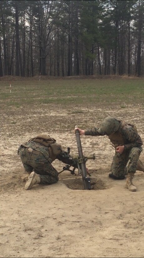 Marines with Company B, 1st Battalion, 25th Marine Regiment, 4th Marine Division, Marine Forces Reserve, fire 60mm mortar rounds in support a company attack during a Mission Rehearsal Exercise aboard U.S. Army Fort A.P. Hill, Va., April 6, 2018. Along with its combat engineer battalion, combat logistics battalion, assault amphibious vehicle and artillery attachments, 1st Bn., 25th Marines, conducted a 10-drill MRX in preparation for Integrated Training Exercise 4-18. This MRX was a stepping stone in a force generation plan to ensure that once 1st Bn., 25th Marines, 1st Bn., 23rd Marines, and other ready bench units complete ITX 4-18, they will be ready to rapidly respond to a national security threat with maximum capability. (Courtesy photo provided by 1st Bn., 25th Marines)25 Marines)