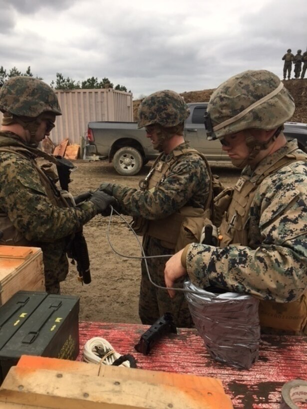 Marines with Company A., 4th Combat Engineer Battalion, 4th Marine Division, Marine Forces Reserve, prepare detonation cord for deception breaches during a platoon and company attack as part of a Mission Rehearsal Exercise aboard U.S. Army Fort A.P. Hill, Va., April 4, 2018. Along with its combat engineer battalion, combat logistics battalion, assault amphibious vehicle and artillery attachments, 1st Battalion., 25th Marine Regiment, conducted a 10-drill MRX in preparation for Integrated Training Exercise 4-18. This MRX was a stepping stone in a force generation plan to ensure that once 1st Bn., 25th Marines, 1st Bn., 23rd Marines, and other ready bench units complete ITX 4-18, they will be ready to rapidly respond to a national security threat with maximum capability. (Courtesy photos provided by 1st Bn., 25th Marines)