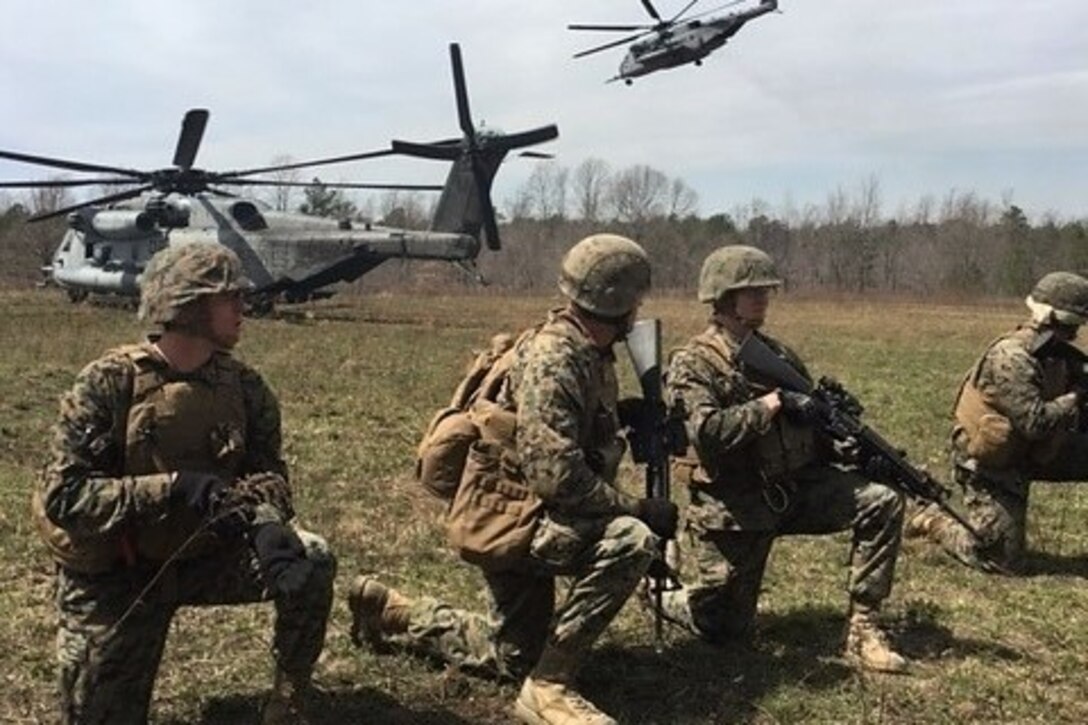 Marines with Company A., 4th Combat Engineer Battalion, 4th Marine Division, Marine Forces Reserve, conduct a helicopter borne assault via MV-22 and CH-53 platforms during platoon attacks as part of a Mission Rehearsal Exercise aboard U.S. Army Fort A.P. Hill, Va., April 6, 2018. Along with its combat engineer battalion, combat logistics battalion, assault amphibious vehicle and artillery attachments, 1st Battalion., 25th Marine Regiment, conducted a 10-drill MRX in preparation for Integrated Training Exercise 4-18. This MRX was a stepping stone in a force generation plan to ensure that once 1st Bn., 25th Marines, 1st Bn., 23rd Marines, and other ready bench units complete ITX 4-18, they will be ready to rapidly respond to a national security threat with maximum capability. (Courtesy photos provided by 1st Bn., 25th Marines)