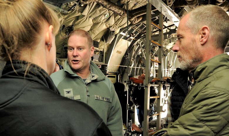 Col. James DeVere, the 302nd Airlift Wing commander, speaks with community leaders part of his wing’s Partners in Leadership Program on board a static displayed C-130 Hercules aircraft during the program’s first event at Peterson Air Force Base, Colorado, April 13, 2018. The program is designed to grow existing relations between military and community leadership and is slated to feature three other events during 2018. (U.S. Air Force photo by Staff Sgt. Frank Casciotta)