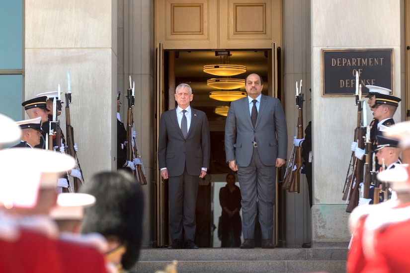 Defense Secretary James N. Mattis stands with Qatari Defense Minister Dr. Khalid bin Mohammed Al-Attiyah outside of the Pentagon.