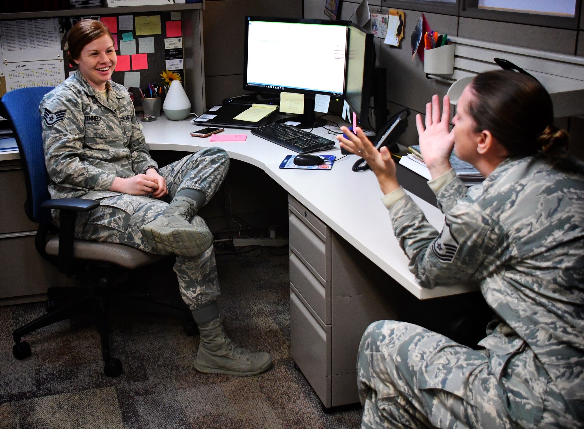 Staff Sgt. Kaitlyn Kennedy, 932nd Airlift Wing Development and Training Flight Coordinator, talks about Air Force Reserve weekend training at Scott Air Force Base with Master Sgt. Tabetha Coley, 932nd Line Recruiter.  Coley and Deb Teague spoke to new unit members about finances during a recent drill weekend at Scott Air Force Base, Ill. Those interested in attending future classes should call 932 Airman & Family Readiness at 229-7556 for more information.   Those interested in joining the unit may call 1-800-257-1212 to see the benefits and openings throughout the reserve system.  (U.S. Air Force photo by Lt. Col. Stan Paregien)