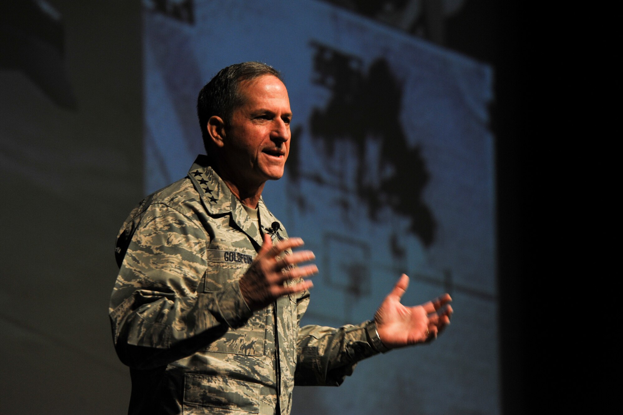 Air Force Chief of Staff Gen. David L. Goldfein talks about his experiences in the Air Force, from being a cadet to now holding the highest rank within the service, during the "Firstie Call" at the Air Force Academy, April 18, 2018. Goldfein encouraged each of the cadets to be an inclusive leader and a role model for all. (U.S. Air Force photo/Tech. Sgt. Julius Delos Reyes)
