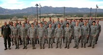 Executive officers from across the 22nd Air Force pose for a photo during the 22nd AF Executive Officer Development Workshop in Colorado Springs, Colorado, April 11, 2018. The workshop, hosted by the 302nd Airlift Wing and the 340th Flying Training Group, was the first of its kind offered across the 22nd Air Force. (U.S. Air Force photo by Staff Sgt. Frank Casciotta)