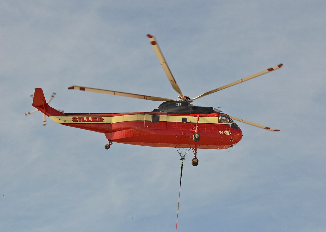 Siller Helicopters, Inc. flew in an S-61V Sikorsky to replace 22 evaporative coolers on the 412th Maintenance Group’s headquarters building. Seven of the coolers also had heaters as part of the unit.
