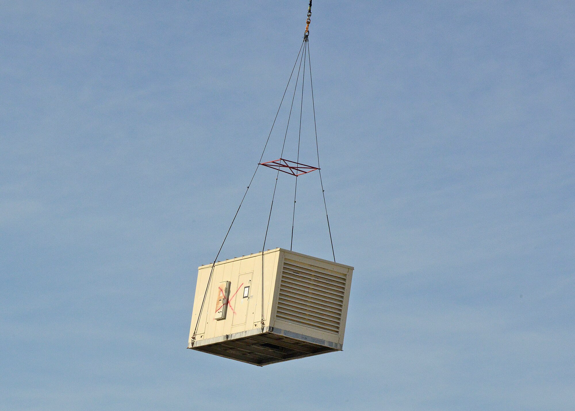 Siller Helicopters, Inc. flew in an S-61V Sikorsky to replace 22 evaporative coolers on the 412th Maintenance Group’s headquarters building. Seven of the coolers also had heaters as part of the unit.