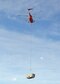 Siller Helicopters, Inc. flew in an S-61V Sikorsky to replace 22 evaporative coolers on the 412th Maintenance Group’s headquarters building. Seven of the coolers also had heaters as part of the unit.