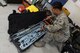 Senior Airman Joseph Nunez, 310th Aircraft Maintenance Unit aerospace propulsion journeyman, inspects a fuel tank installation kit at Luke Air Force Base, Ariz., April 18, 2018. The installation kit and other cargo will  be used at a training event in San Diego, Calif. (U.S. Air Force photo by Senior Airman Pedro Mota)