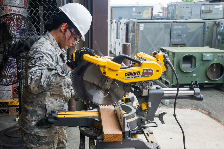 U.S. Air Force Senior Airman Veleesa Conley, of Wahiawa, Hawaii, a structural engineer with the Air Force Reserve’s 624th Civil Engineer Squadron, cuts lumber for a door frame during a unit training assembly at April 8, 2018, Joint Base Pearl Harbor-Hickam, Hawaii. The 624th CES is comprised of multiple Prime Base Engineer Emergency Force and Firefighting teams ready to support worldwide deployments to construct and maintain airfield and facilities, provide firefighting support, and coordinate planning for any real world disasters. (U.S. Air Force photo by Master Sgt. Theanne Herrmann)