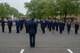 Airmen from the 374th Medical Group stand in formation during an open-ranks inspection at Yokota Air Base, Japan, April 19, 2018.