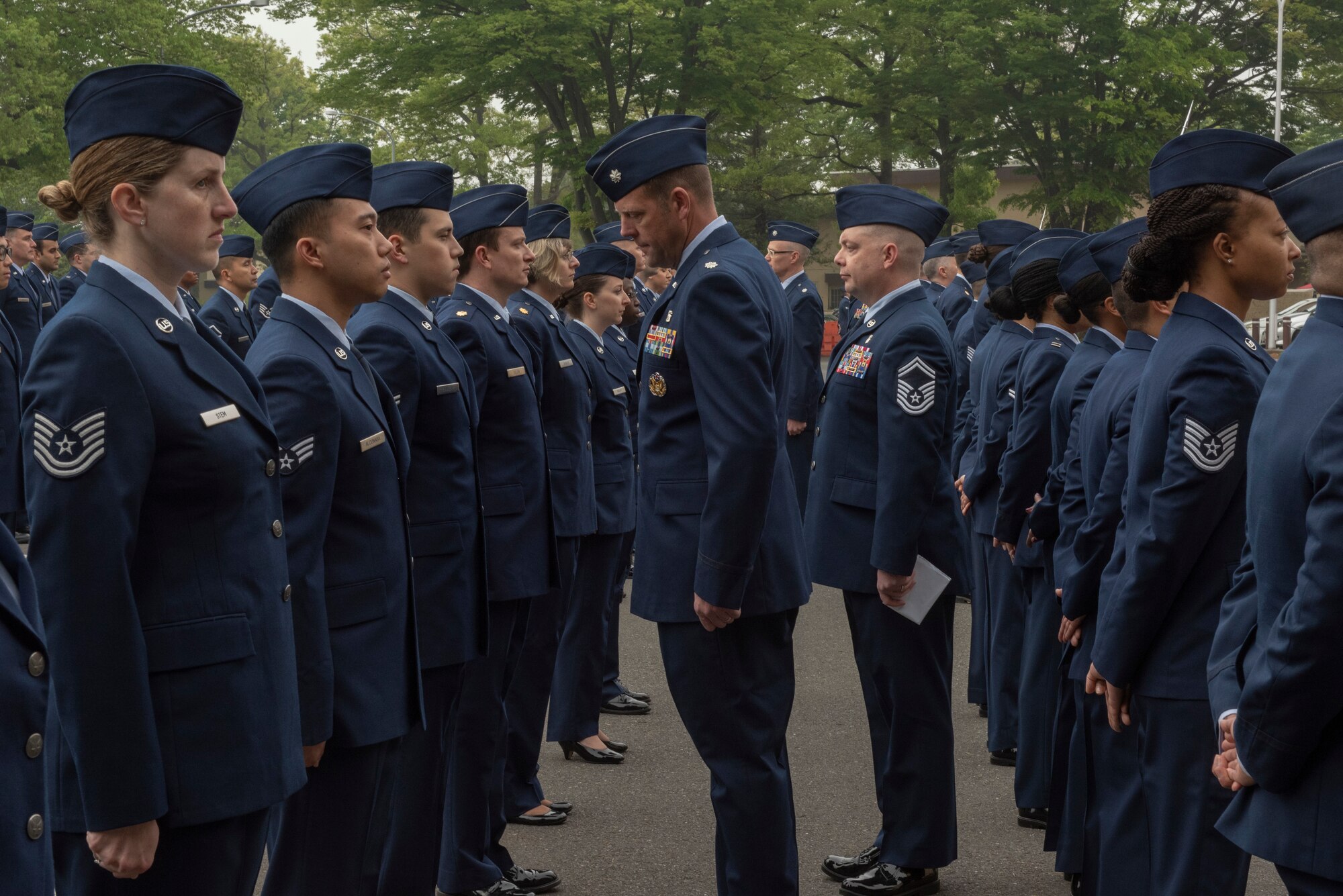 Lt. Col. Richard Woodruff, 374th Aerospace Medicine Squadron commander, inspects an Airman during the 374th Medical Group open-ranks inspection at Yokota Air Base, Japan, April 19, 2018.