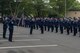 Airmen from the 374th Medical Group stand at the position of attention as an open-ranks inspection comes to a close at Yokota Air Base, Japan, April 19, 2018.