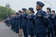 Airmen from the 374th Medical Group stand in formation during an open-ranks inspection at Yokota Air Base, Japan, April 19, 2018.