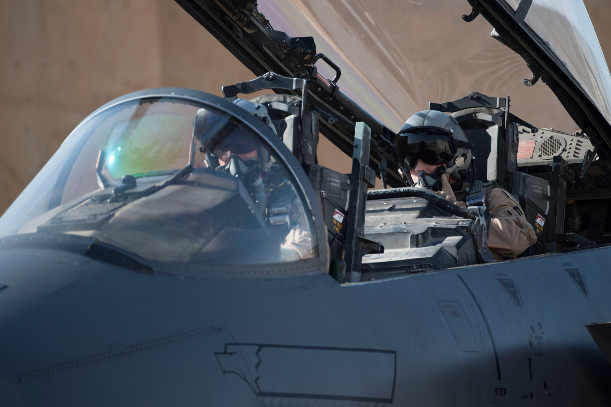 A 332nd Air Expeditionary Fighter Squadron pilot and weapon system officer prepare for takeoff in an F-15E Strike Eagle March 7, 2018, at an undisclosed location in Southeast Asia.