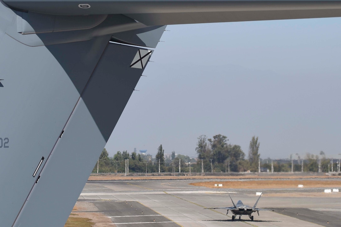 U.S. Air Force members from the F-22 Raptor Demonstration Team, based out of Joint Base Langley-Eustis, Virginia, performed at Feria Internacional del Aire y del Espacio air and trade show in Santiago, Chile April 2-7, 2018.