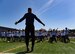 Kyle Rudolph, NFL Minnesota Vikings tight end, warms up with camp attendees during the free NFL camp at the Kaiserslautern High School football stadium on Kapaun Air Base, Germany, April 7, 2018. The camp, which ran April 7-8, featured daily, three-hour training sessions.