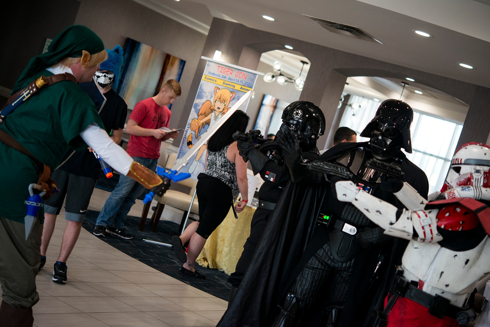 Cosplayers pose for a photo while at Tiger Con, April 14, 2018, in Valdosta, Ga. Tiger Con was a convention, open to Moody residents and the local community, geared toward giving pop culture enthusiasts a chance to dress and role play as their favorite movie, TV show or comic characters. The event included a costume contest, an anime themed café, pop-culture artist panels along with shopping vendors and a guest appearance of veteran voice actor Richard Epcar, who’s known for portraying Raiden in the video series Mortal Kombat. (U.S. Air Force photo by Airman 1st Class Erick Requadt)