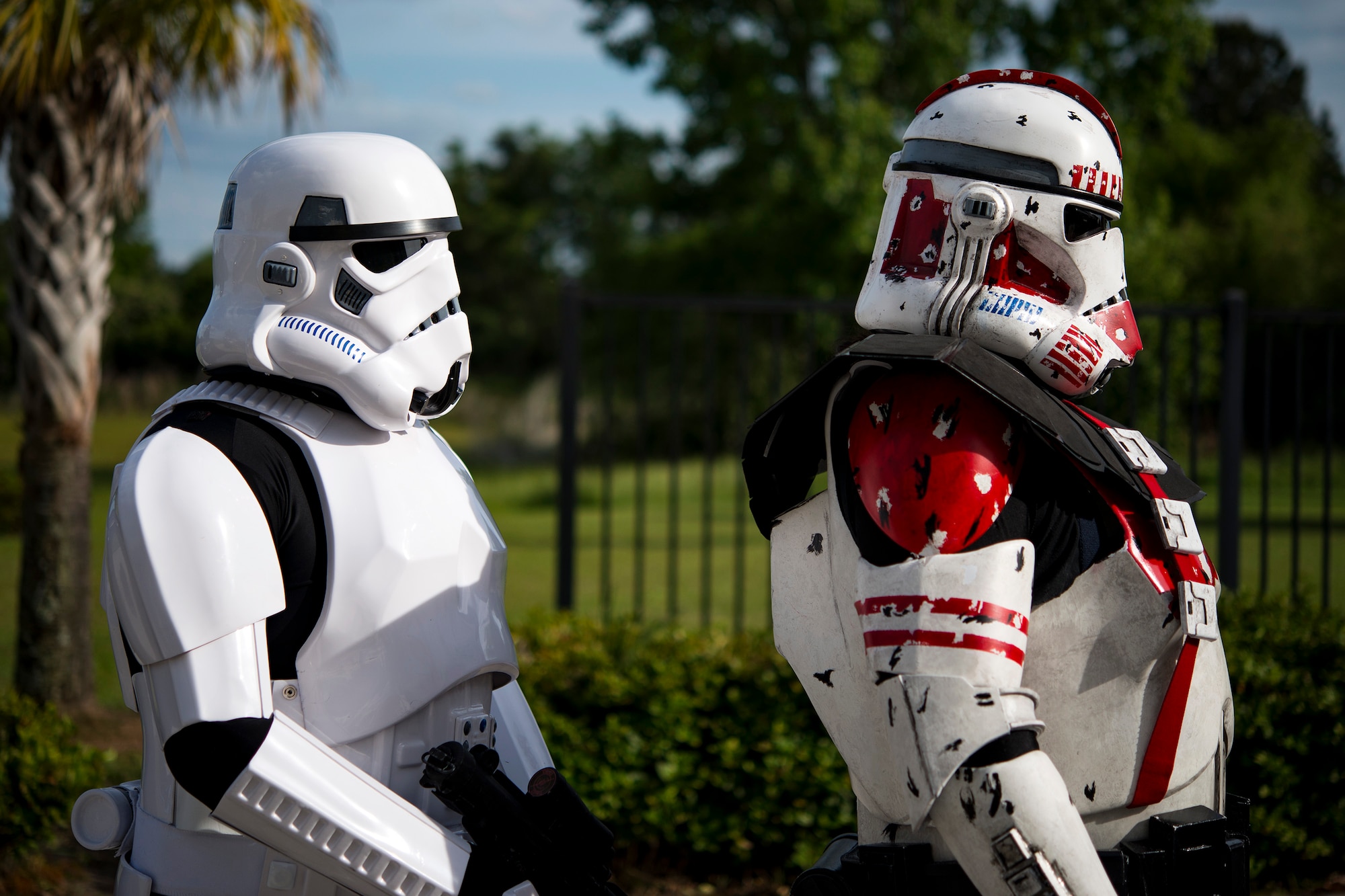 Greg Ferrell, left, cosplayer, and David Tischhauser, 23d Fighter Group unit deployment manager, wait in line during for a costume contest while at Tiger Con, April 14, 2018, in Valdosta, Ga. Tiger Con was a convention, open to Moody residents and the local community, geared toward giving pop culture enthusiasts a chance to dress and role play as their favorite movie, TV show or comic characters. The event included a costume contest, an anime themed café, pop-culture artist panels along with shopping vendors and a guest appearance of veteran voice actor Richard Epcar, who’s known for portraying Raiden in the video series Mortal Kombat. (U.S. Air Force photo by Airman 1st Class Erick Requadt)