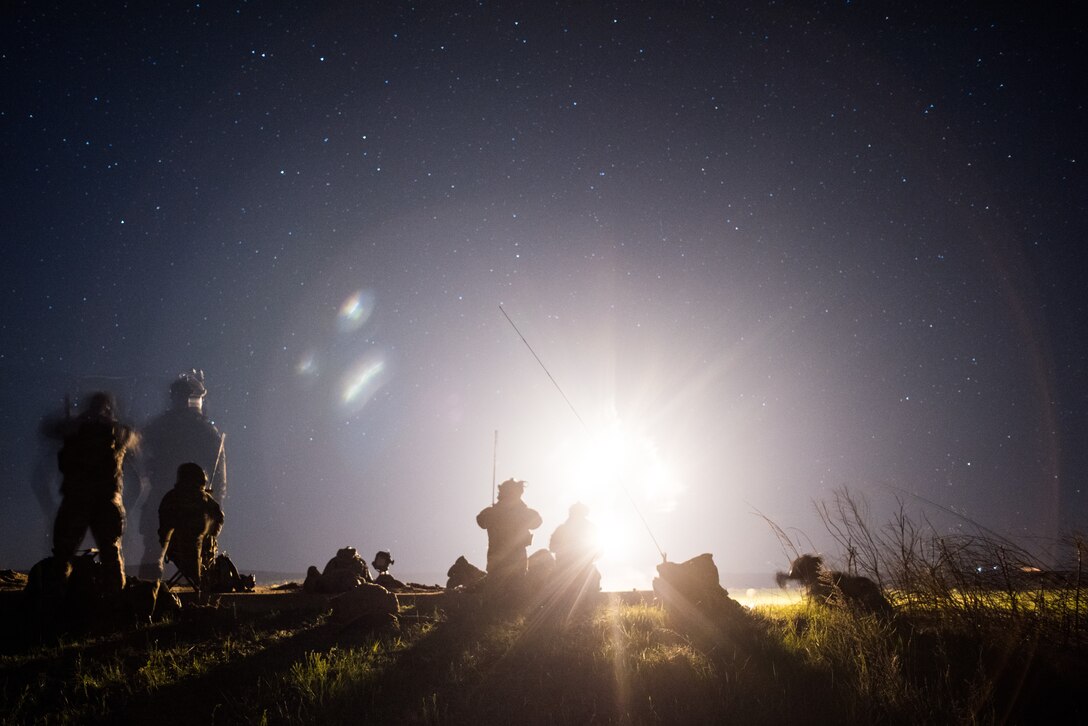 Tactical Air Control Party specialists locate targets during a night operation while participating in a field training exercise, or FTX, at Fort Chaffee Maneuver Training Center in Arkansas, April 14, 2018. The FTX, April 13-17, 2018, took place at the end of a two-month Initial Combat Skills Training Course, which is hosted by the 138th Combat Training Flight at Will Rogers Air National Guard Base in Oklahoma City, and is the only one of its kind in the U.S. Air Force. (U.S. Air National Guard Photo by Staff Sgt. Tyler K. Woodward)