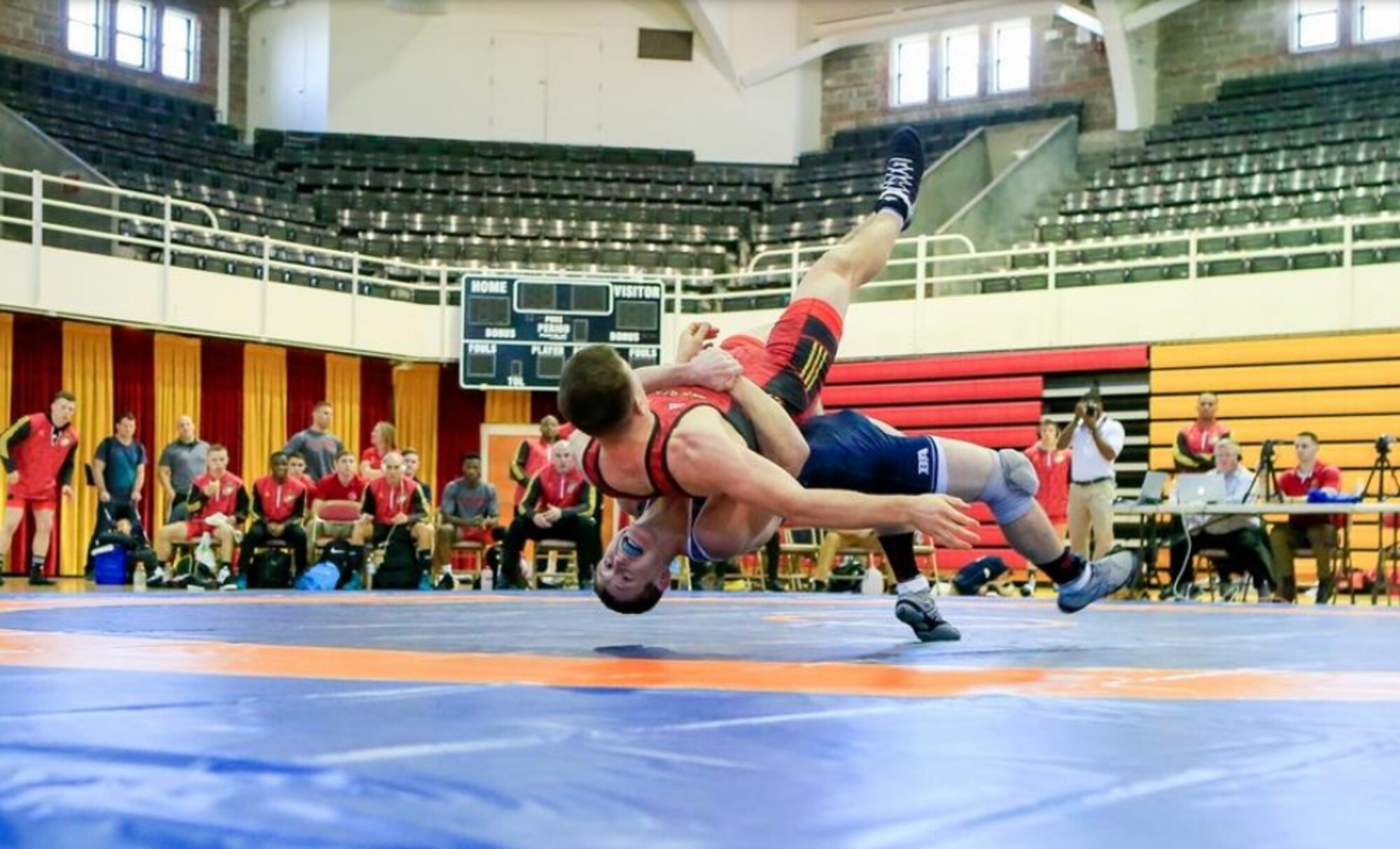 Capt. Brandon Mueller, in blue, takes down a challenger at the 2018 Armed Forces Championships.  Mueller, Air Force Research Laboratory’s Space Vehicles Directorate, will compete in Las Vegas in April.