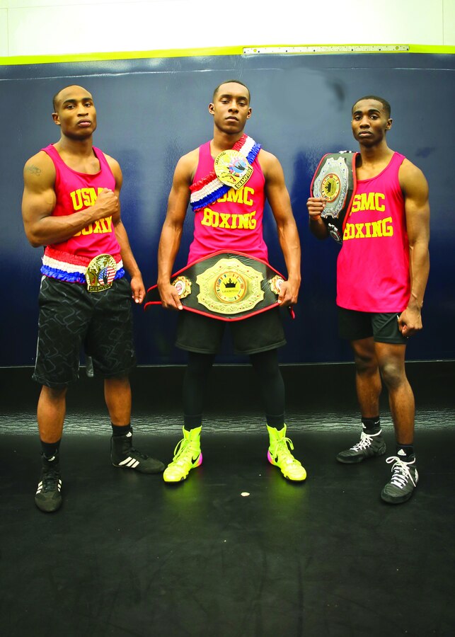 Lance Cpl. Keandre Blackshire, Cpl. Malik Collins, and Cpl. Oubigee Jones fought in the Marine Corps and Chevrolet Freedom Fight exhibition aboard Marine Corps Base Camp Lejeune April 14. The Marines were able to represent the Marine Corps Boxing Team in the exhibition match and had the opportunity to fight in front of retired and current boxing legends. The Marines are Administrative Specialists with the Installation Personnel Administrative Center.