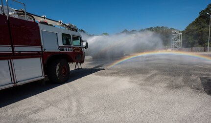 A Joint Base Charleston firetruck sprays water April 12, 2018, at Joint Base Charleston, S.C.