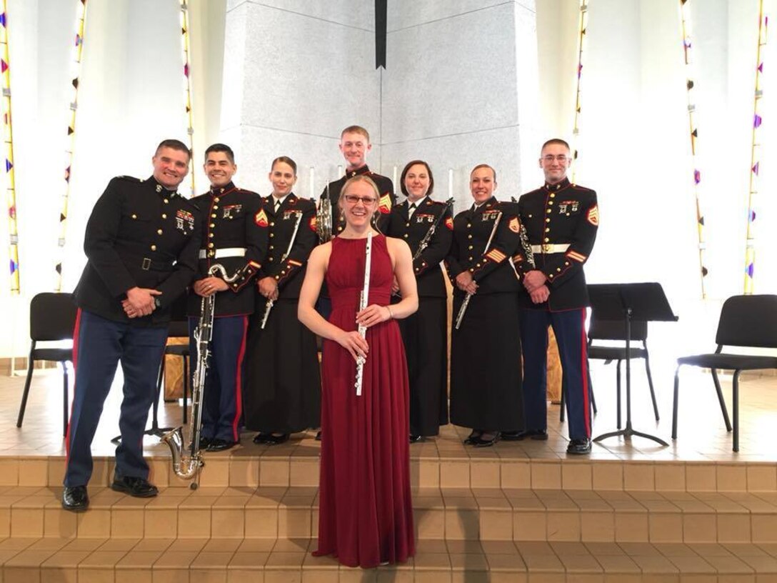 Jessica Backes, a Gustavus Adolphus College music performance major and Marine enlistee, poses for a photo alongside members of the 2nd Marine Division Band Woodwind Quintet, after her senior flute recital, Sunday, April 15, in St. Peter, Minnesota. Backes will graduate June with honors before leaving for Marine Corps recruit training at Marine Corp Recruit Depot Parris Island, South Carolina. Once training is complete, Backes will be permanently assigned to one of the 10 performing Marine Corps bands.