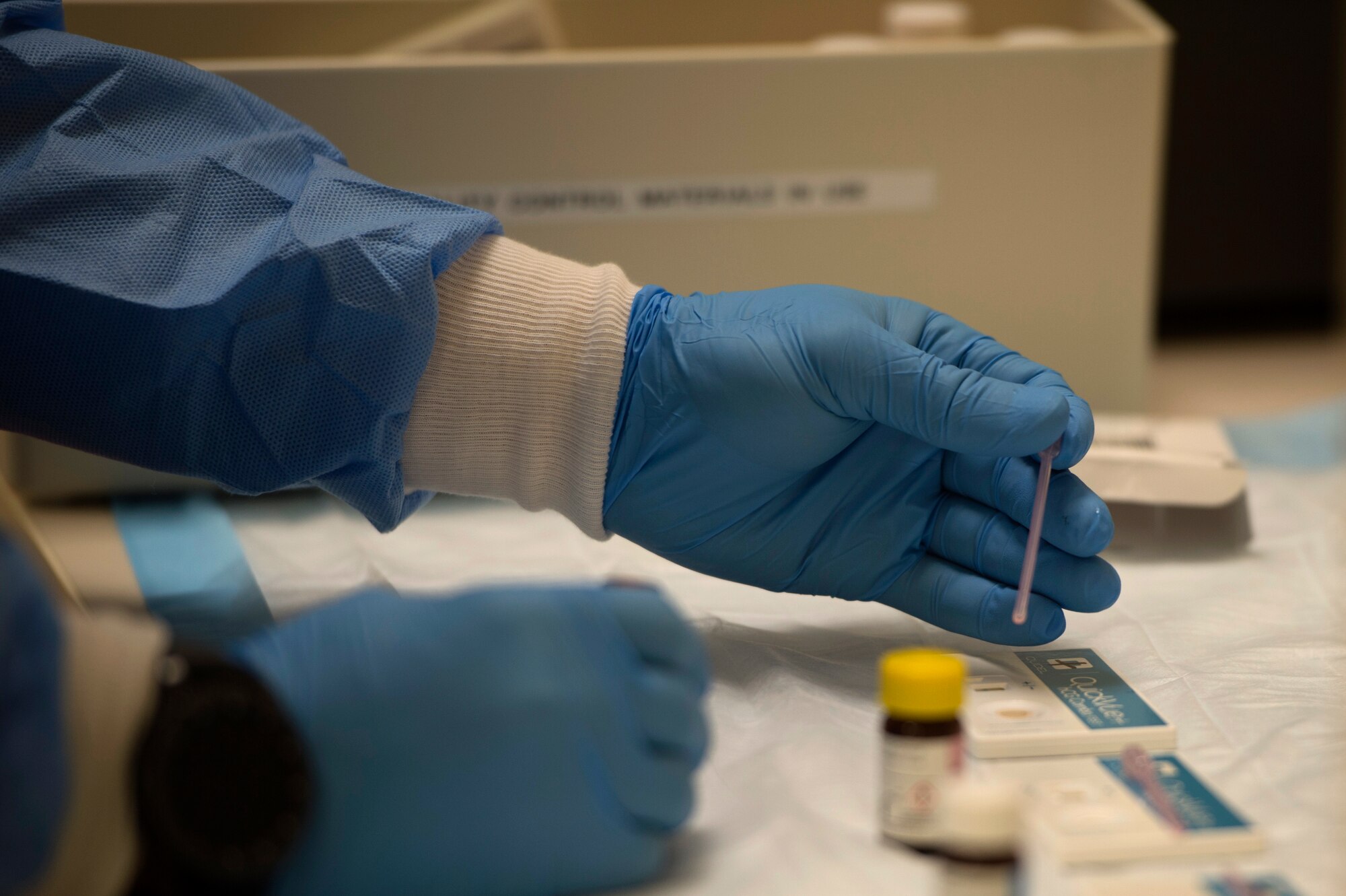 U.S. Air Force Senior Airman Tristian Riley, a medical laboratory technician assigned to the 6th Medical Support Squadron, prepares equipment to perform pregnancy tests April 17, 2018 at MacDill Air Force Base, Fla.