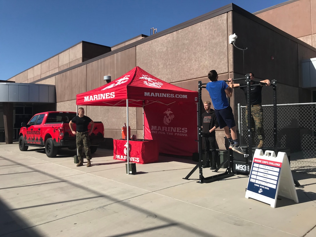 Marine Corps recruiters from St. George, Utah attended the 2018 Desert Hills Track and Field Invitiational  at Desert Hills High School April 20-21, 2018. The Marines hosted a pull-up challenge, talked to students interested in the Marine Corps and provided information about Marine Corps opportunities. (U.S. Marine Corps photo by Sgt. Nicole Zurbrugg)