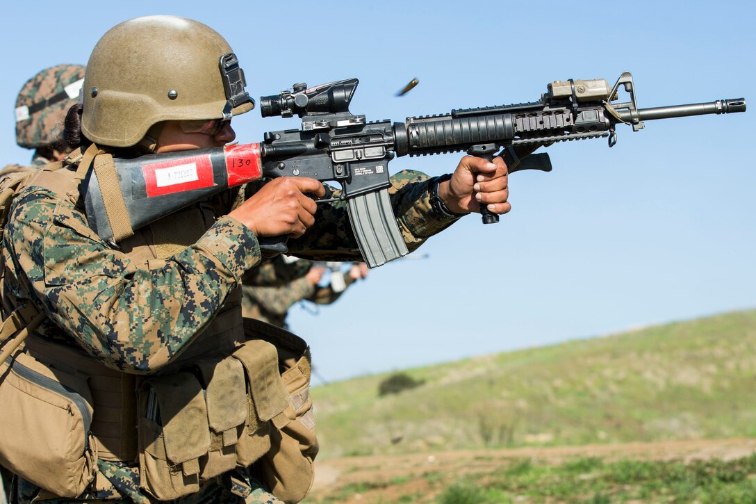 A Marine conducts a buddy rush.