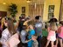 Families gather in line for a book during the Books on Bases event at the Ka Makani Community Center, Joint Base Pearl Harbor-Hickam, Hawaii, April 13, 2017. The event was held to celebrate the Month of the Military Child, and to recognize the unique lifestyle of military families. (U.S. Air Force photo by Tech. Sgt. Heather Redman)